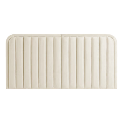 Cream upholstered headboard with vertical channels on white background