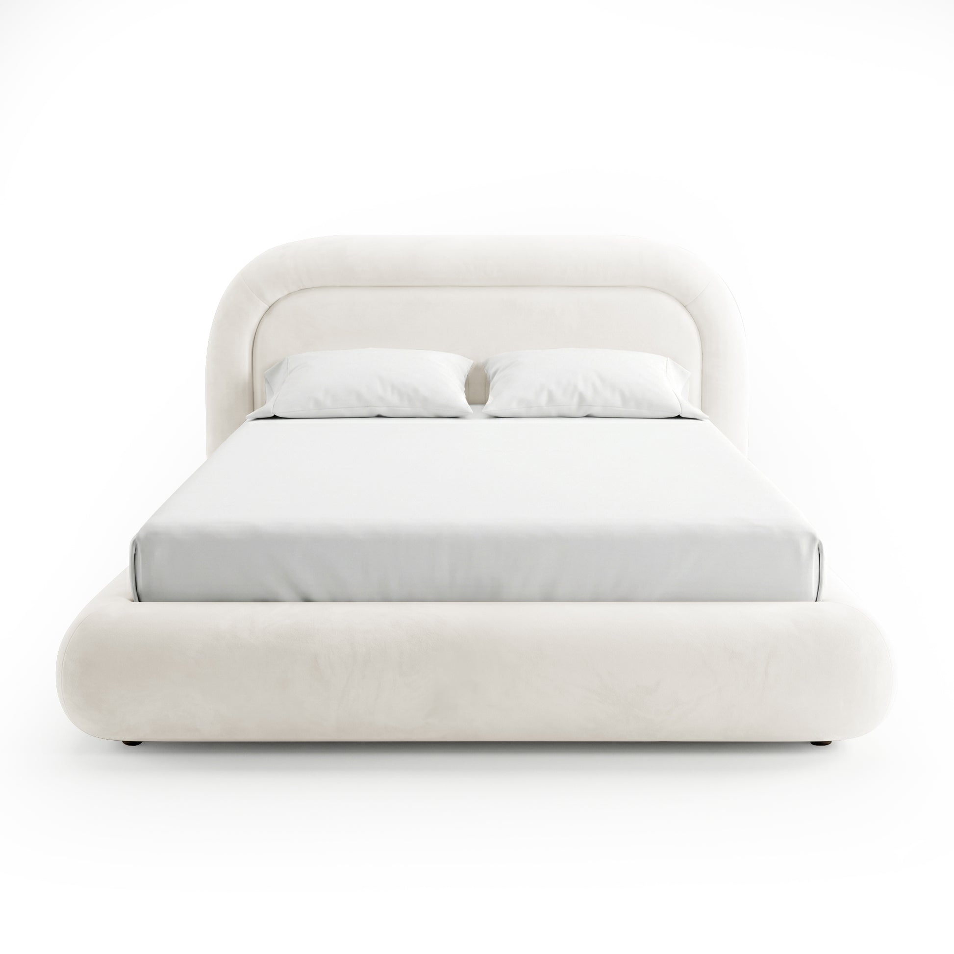 Front view of upholstered bed with pillows on white background