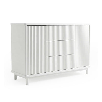 Modern white dresser with grooved front on white background