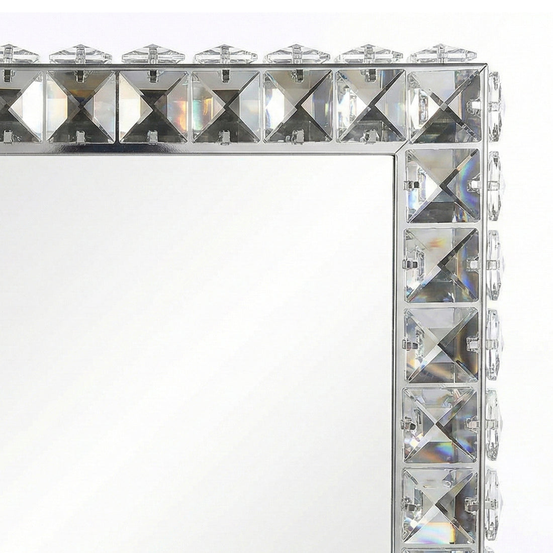 Close-up of crystal-like embellished corner of mirror frame