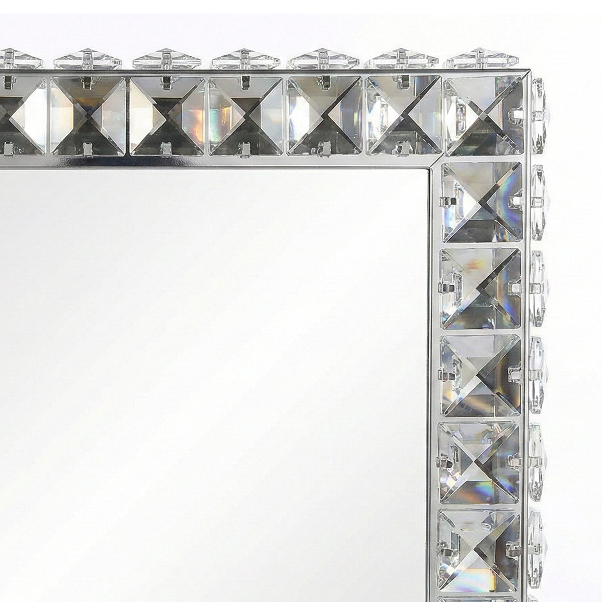 Close-up of crystal-like embellished corner of mirror frame