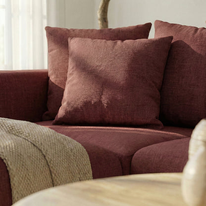 Close-up of sofa corner with throw in living room