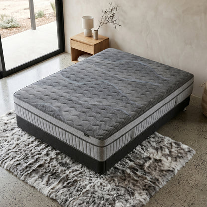 Mattress in a bright modern room with a nightstand