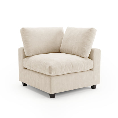Light beige upholstered corner chair on white background