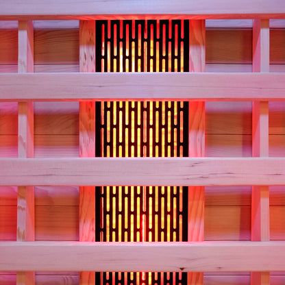 Close-up of wooden slats with glowing sauna heating panel behind them