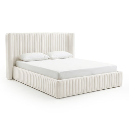 Channel-tufted bed with mattress and pillows on white background