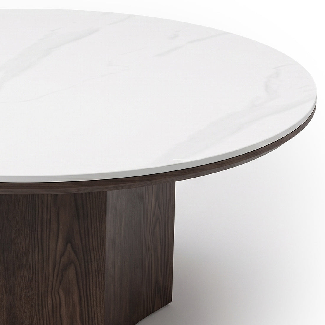 Close-up of a round table showing the tabletop and partial base on a white background.