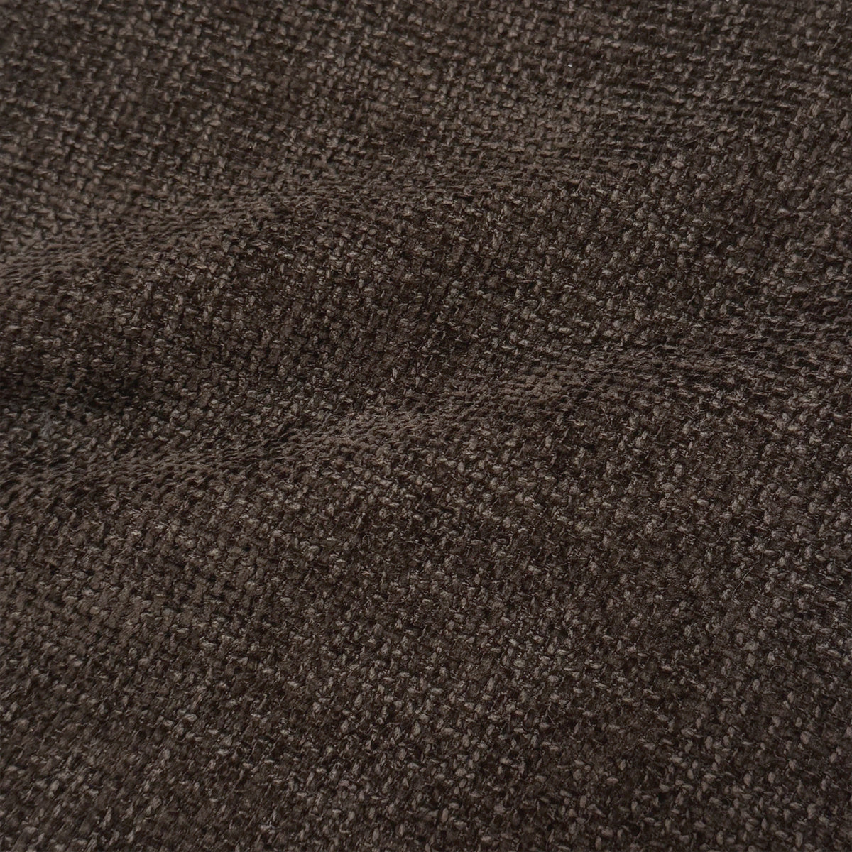 Close-up of dark brown textured fabric upholstery