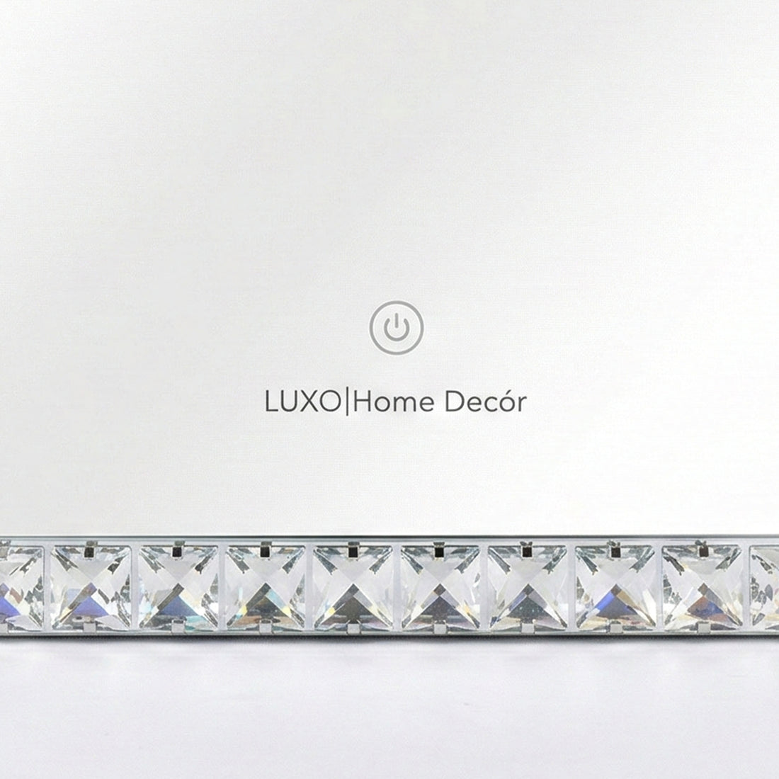 Close-up of mirror border with LUXO Home Décor branding and touch icon