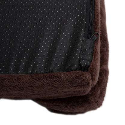 Detail of brown plush bed corner with zipper and non-slip bottom