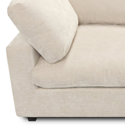 Close-up of beige sofa arm, seat, and back on white background