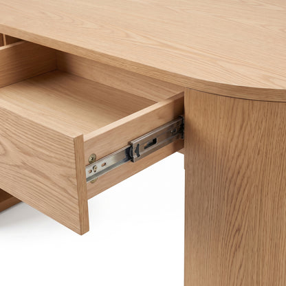 Close-up of a wooden desk drawer on white background