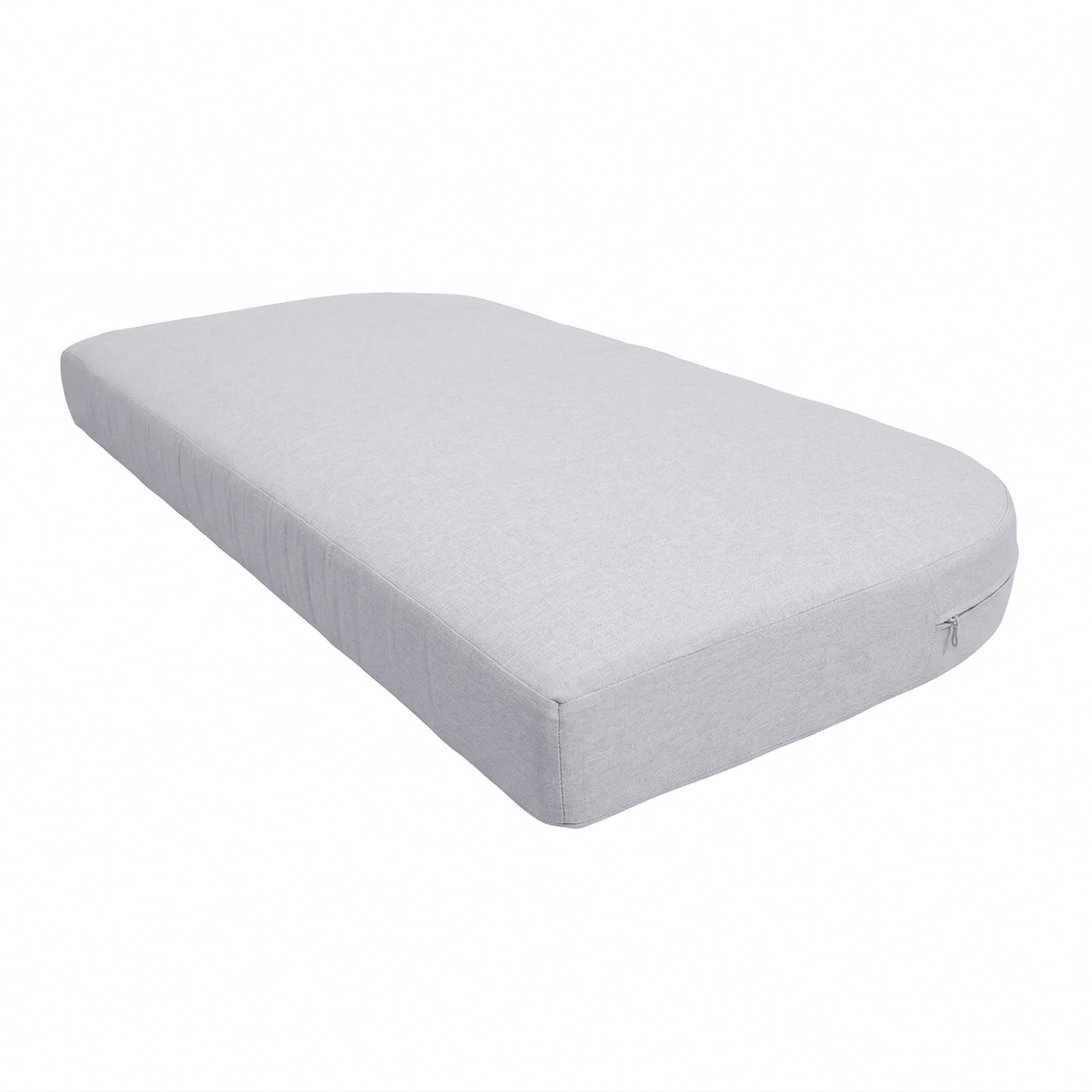 Light grey mattress or cushion with rounded corners on a white background