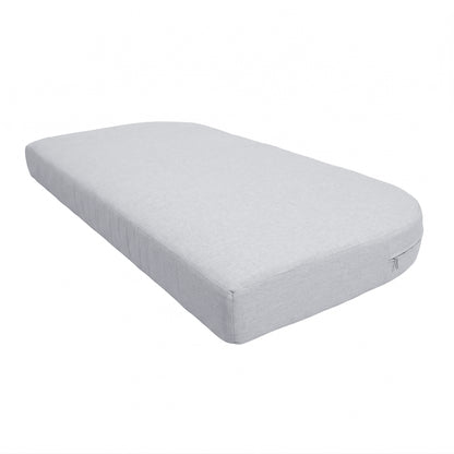 Light grey mattress or cushion with rounded corners on a white background