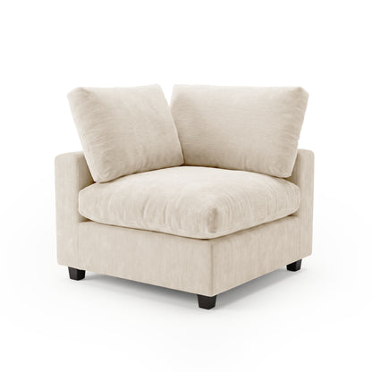 Light beige upholstered corner chair on a white background