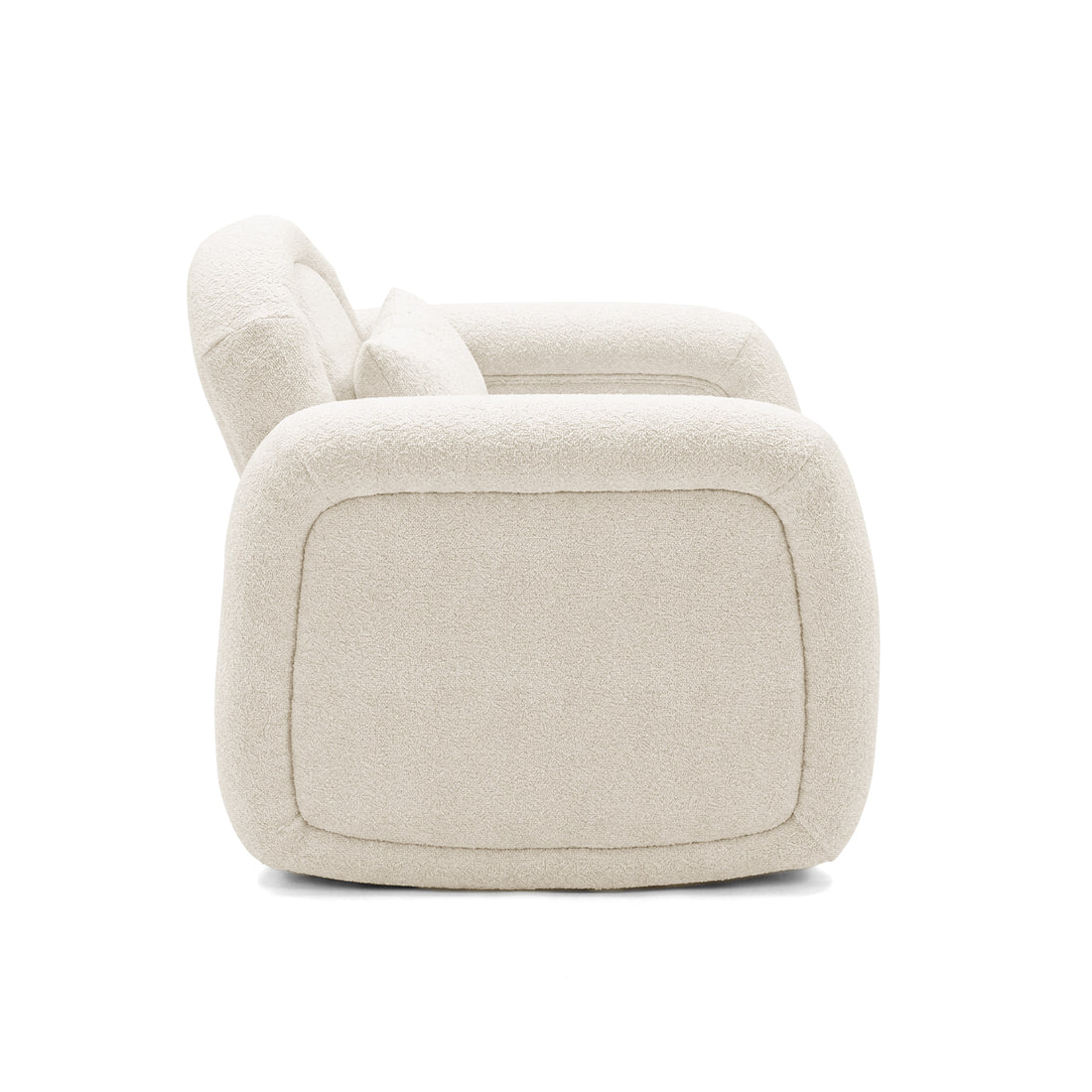 Side view of cream-colored armchair on white background