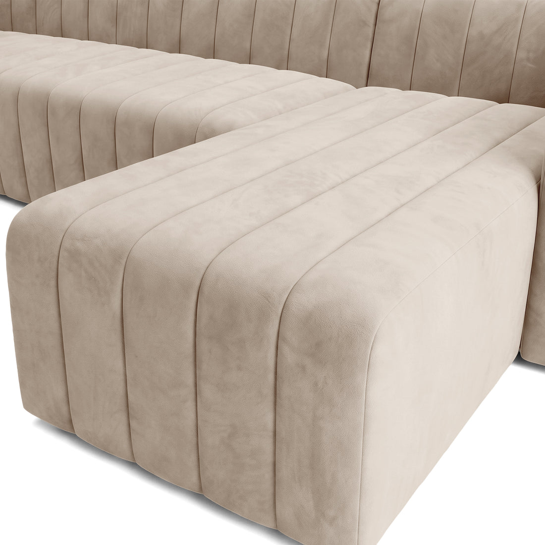 Partial view of a beige sectional sofa on a white background