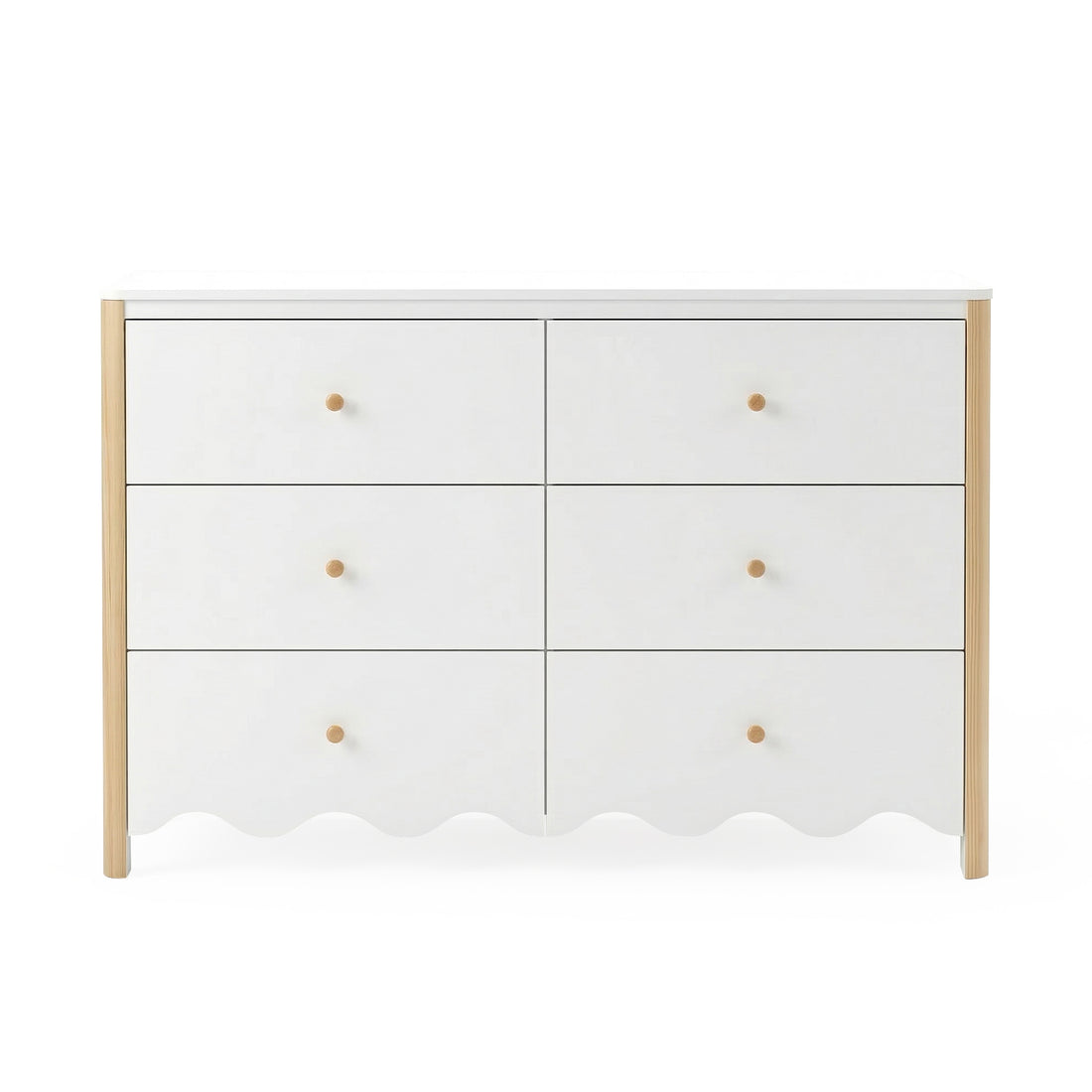 Front view of white six-drawer dresser with scalloped edge and wood accents on white background