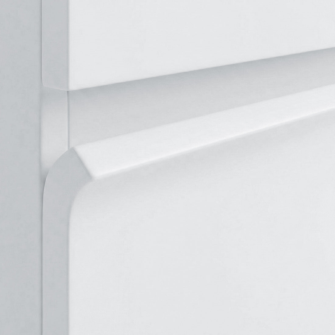 Close-up of cabinet corner and smooth white finish