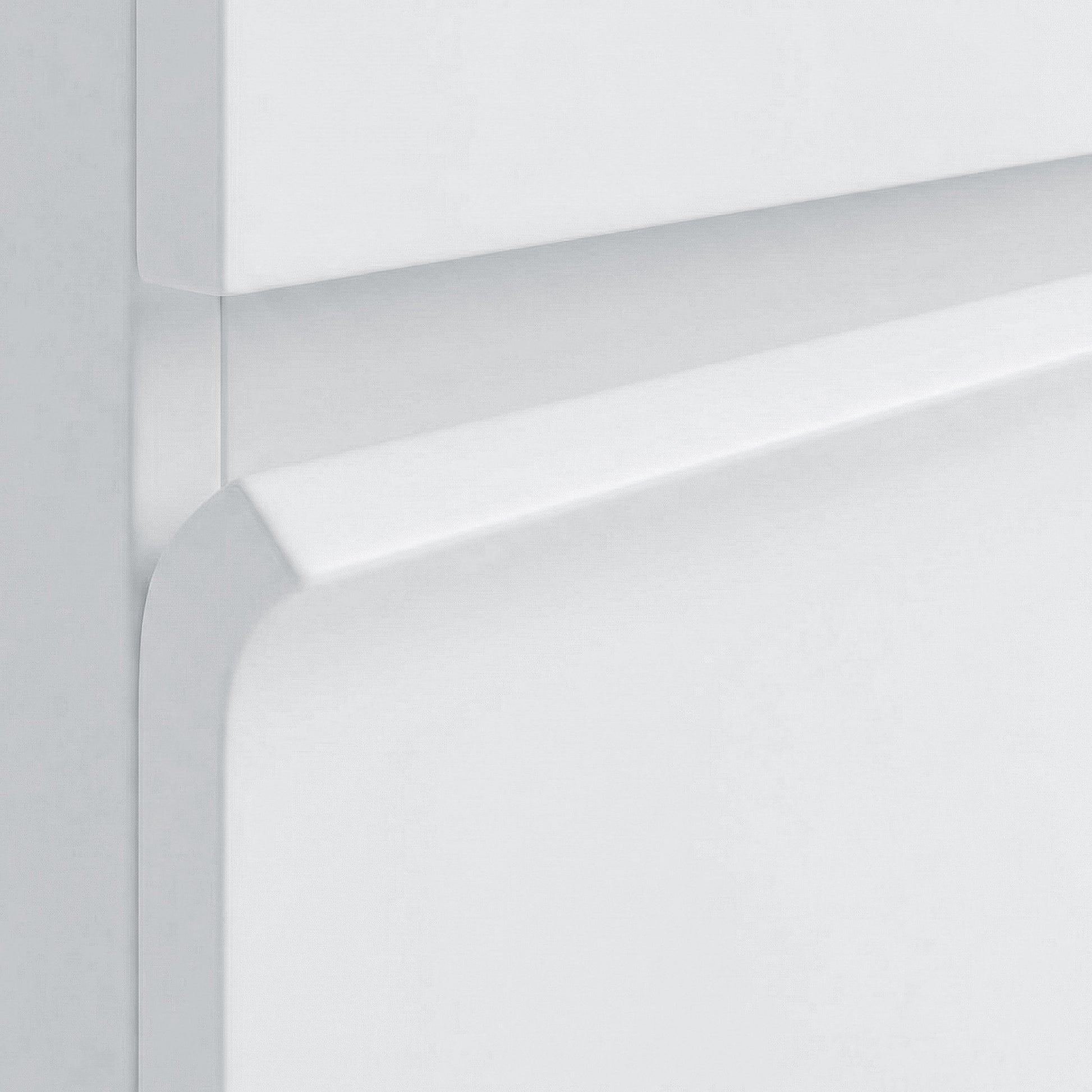 Close-up of cabinet corner and smooth white finish