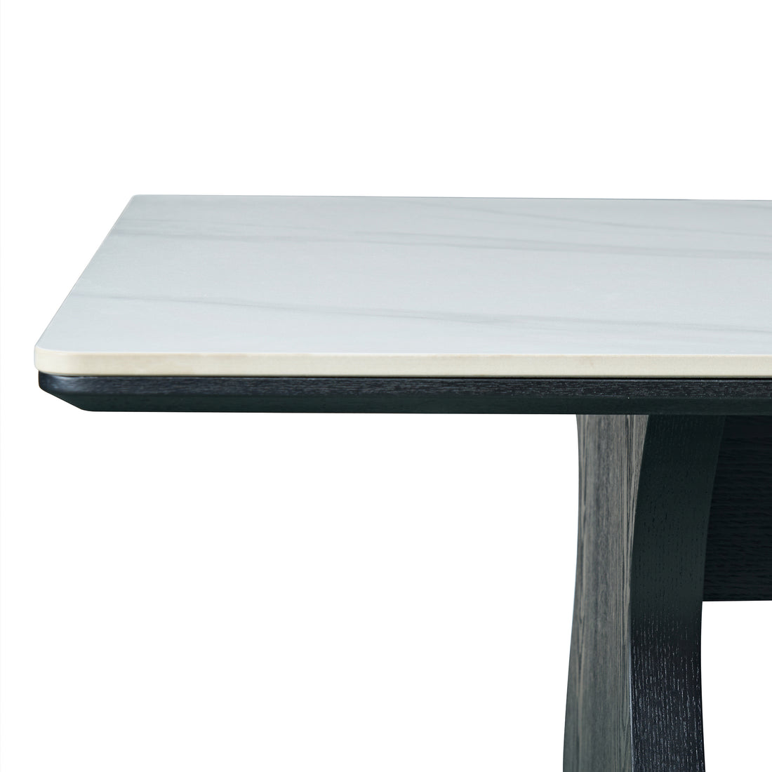Close-up of table corner with light top and dark leg on white background