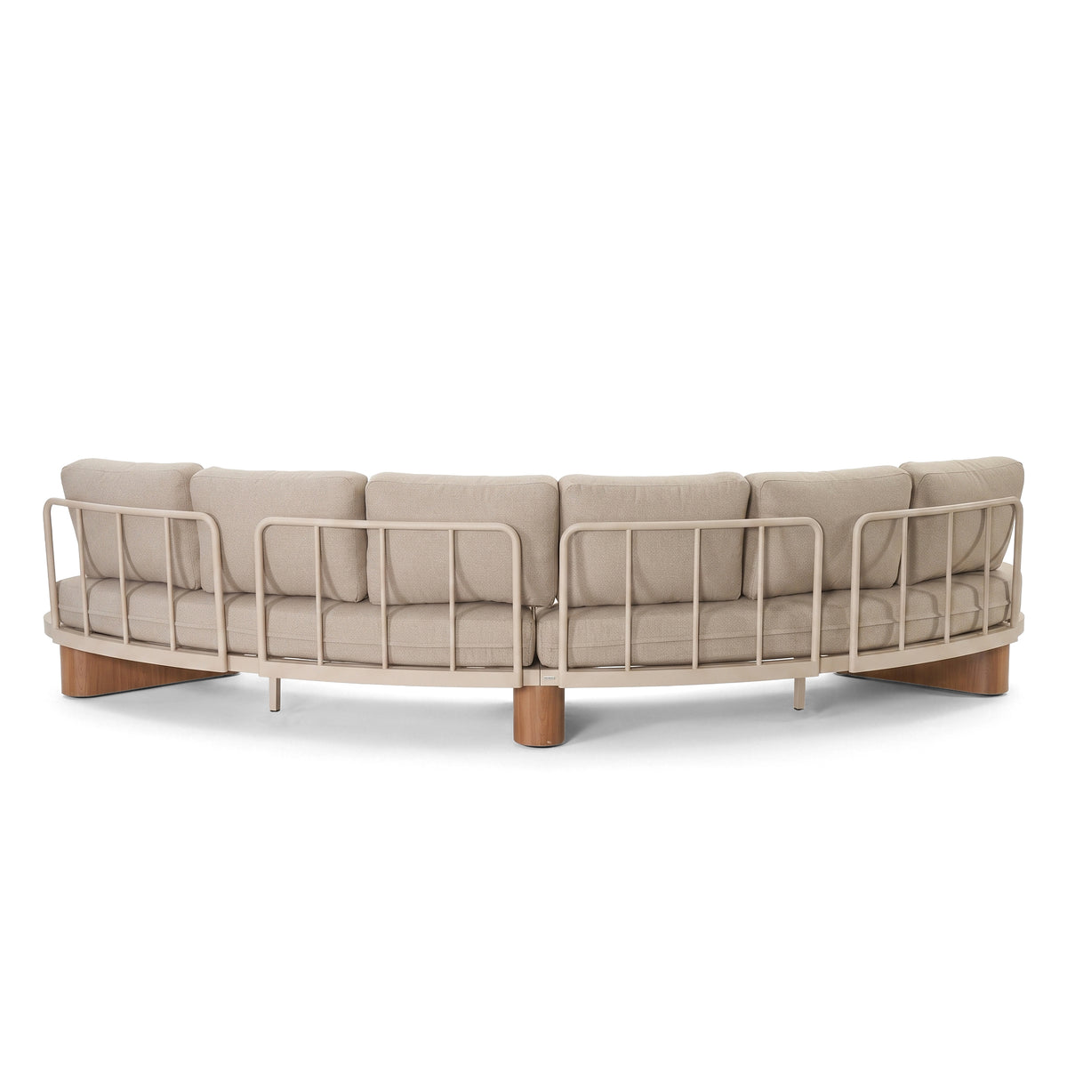 Curved sofa with metal frame and beige cushions on a white background