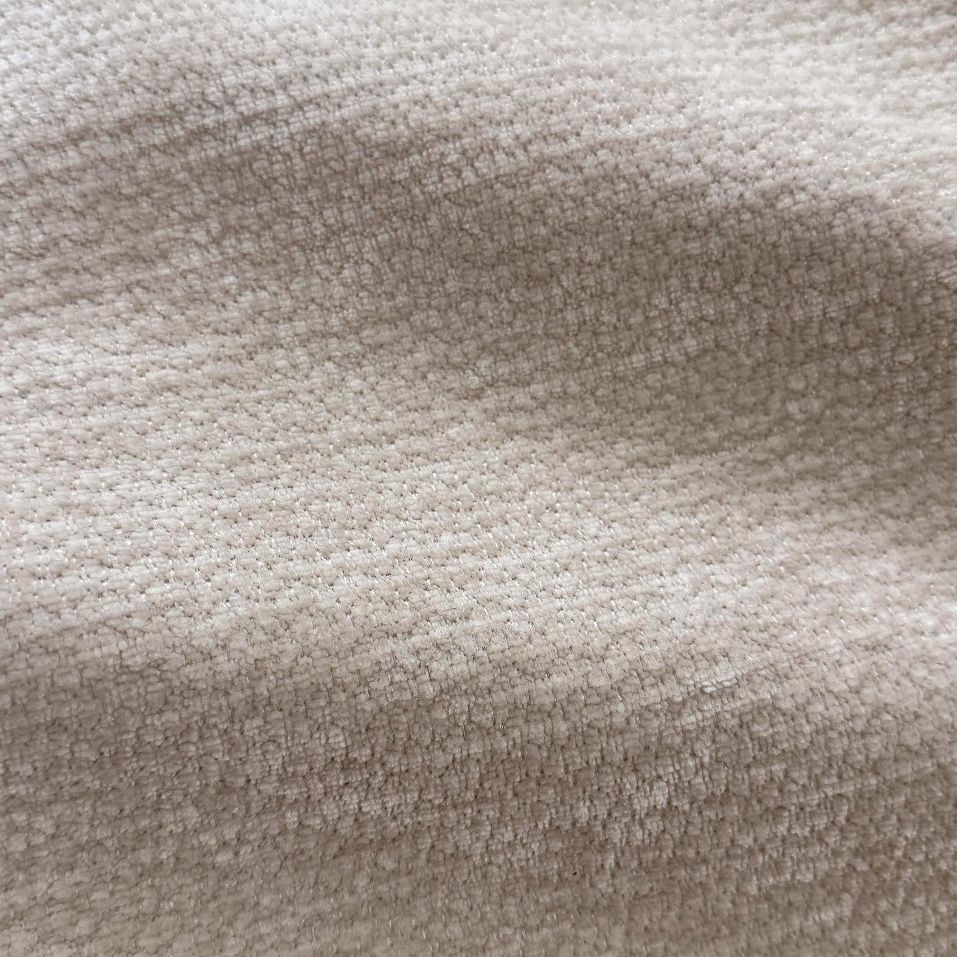 Close-up of beige woven fabric texture