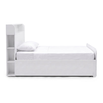 Side view of a white bed with integrated shelving in the headboard on a white background.