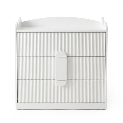 White three-drawer dresser on a white background, front view