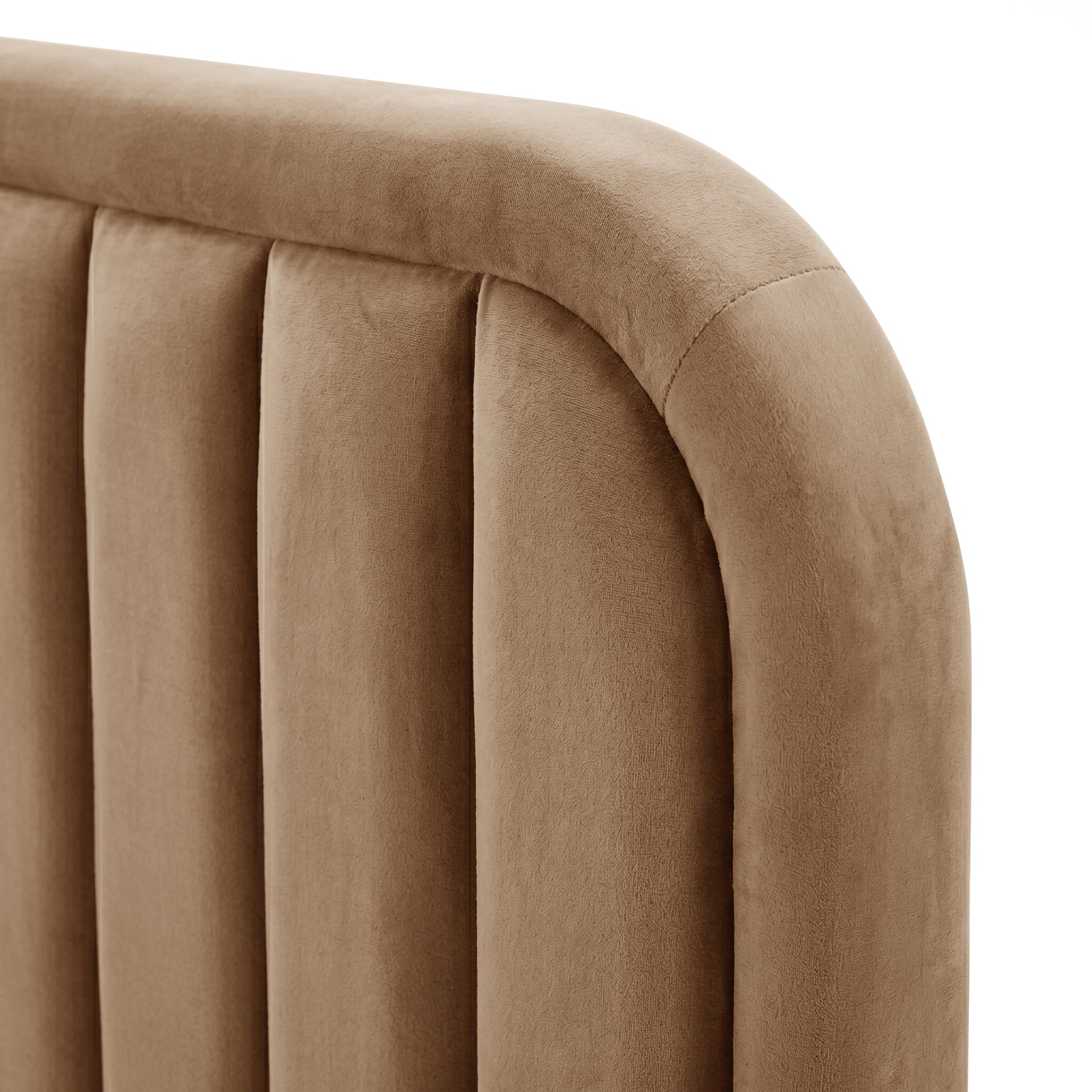 Close-up detail of tan upholstered headboard fabric texture