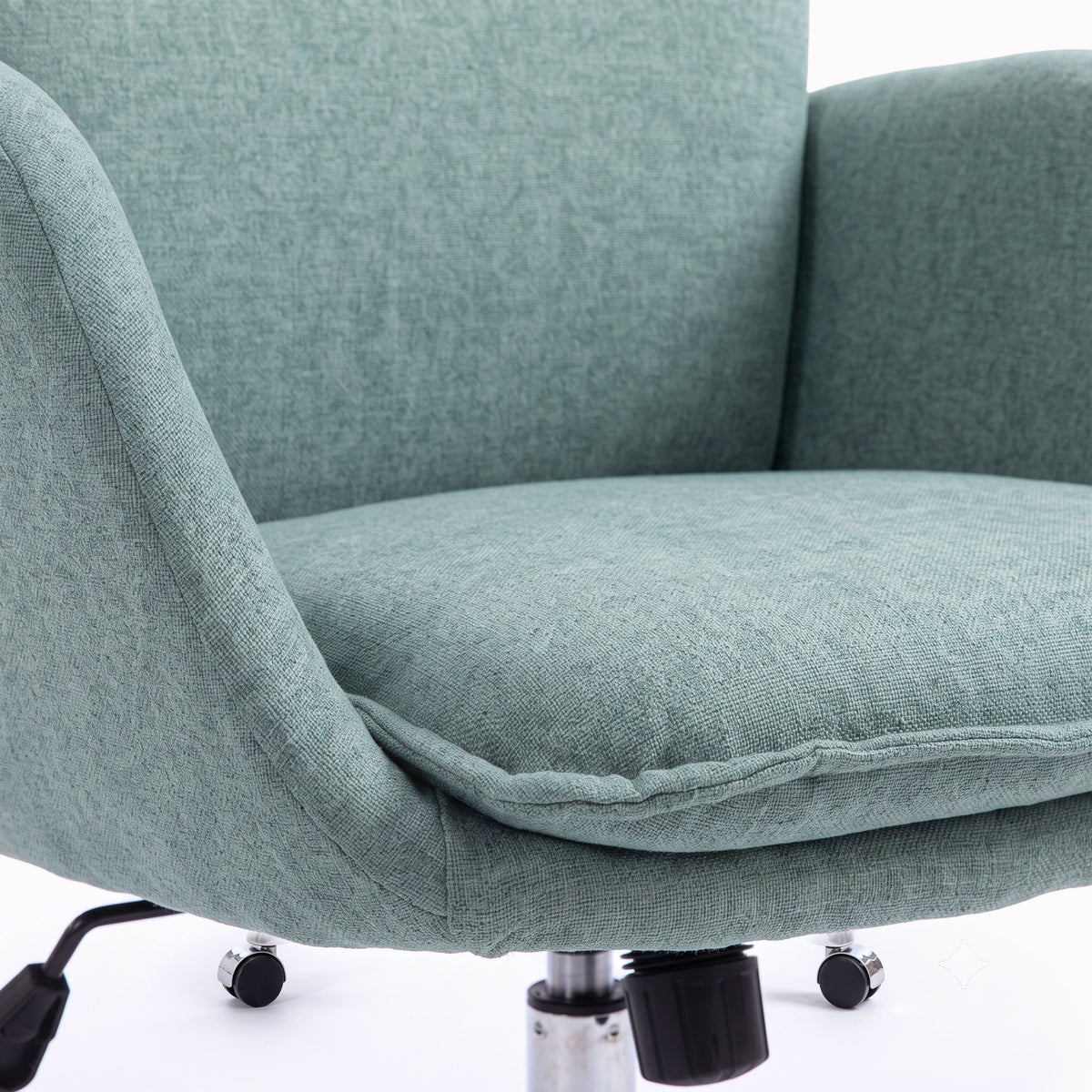 Close-up of chair seat and armrest on a white background