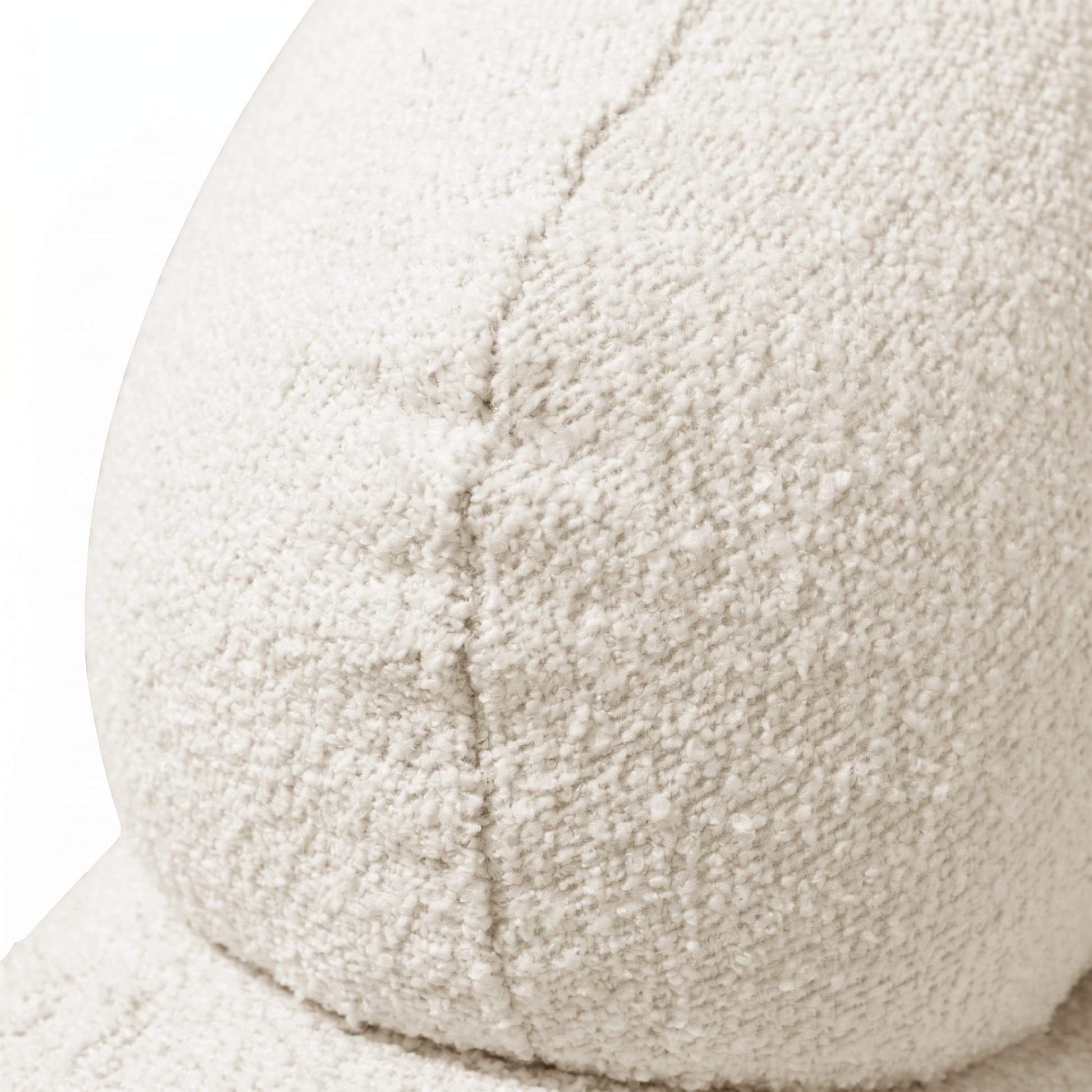 Close-up of boucle fabric texture and seam