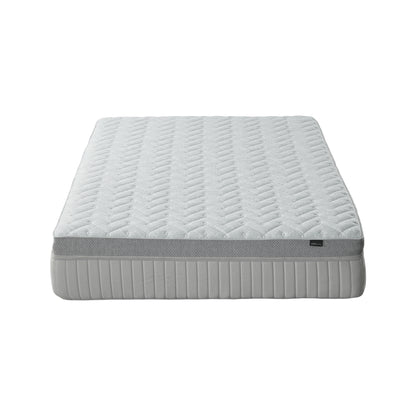 Full mattress photographed on a white background