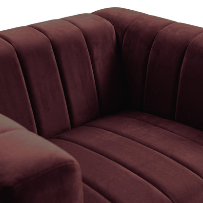 Close-up of burgundy sofa upholstery and seating area on a white background