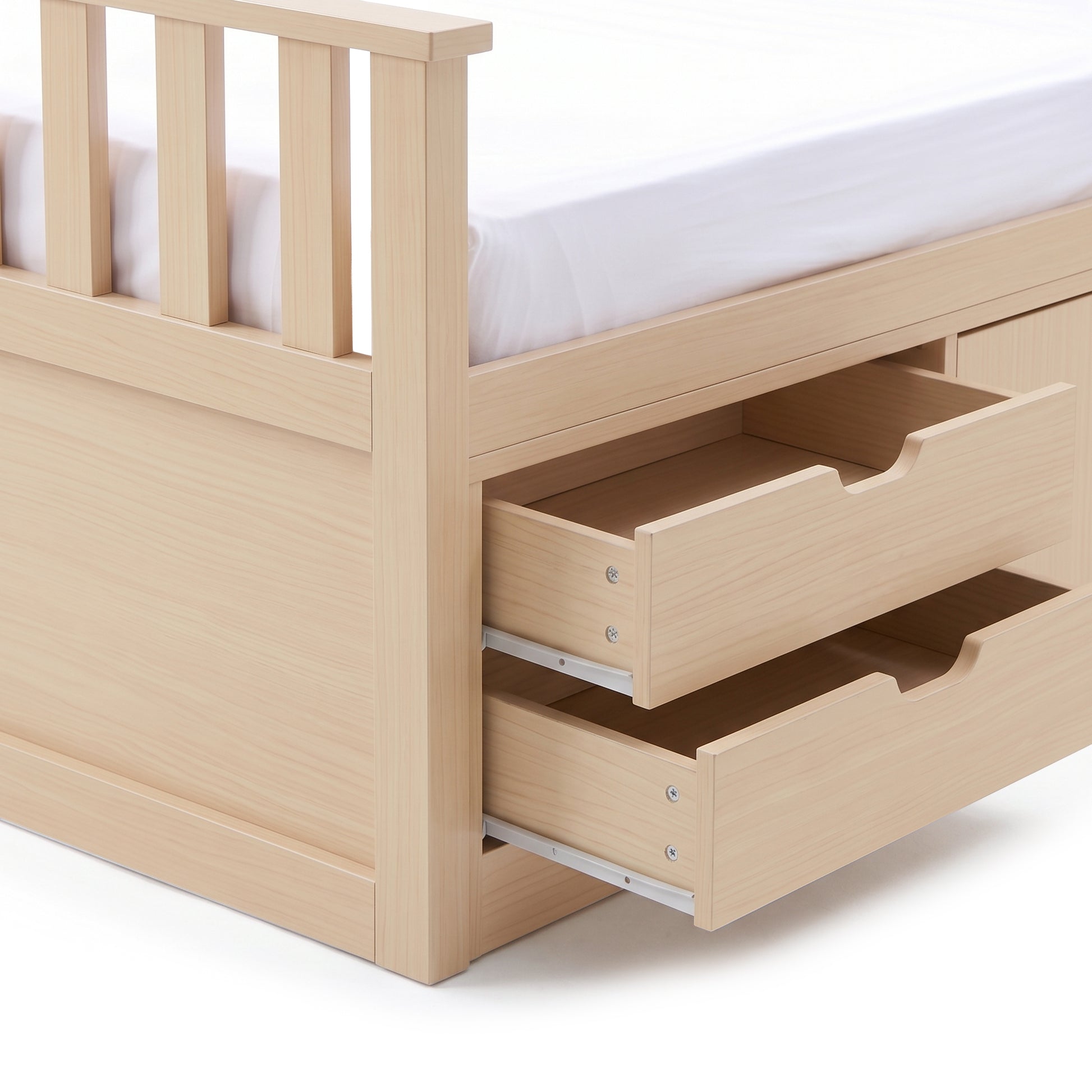 Close-up of wooden bed frame corner with open storage drawers on a white background