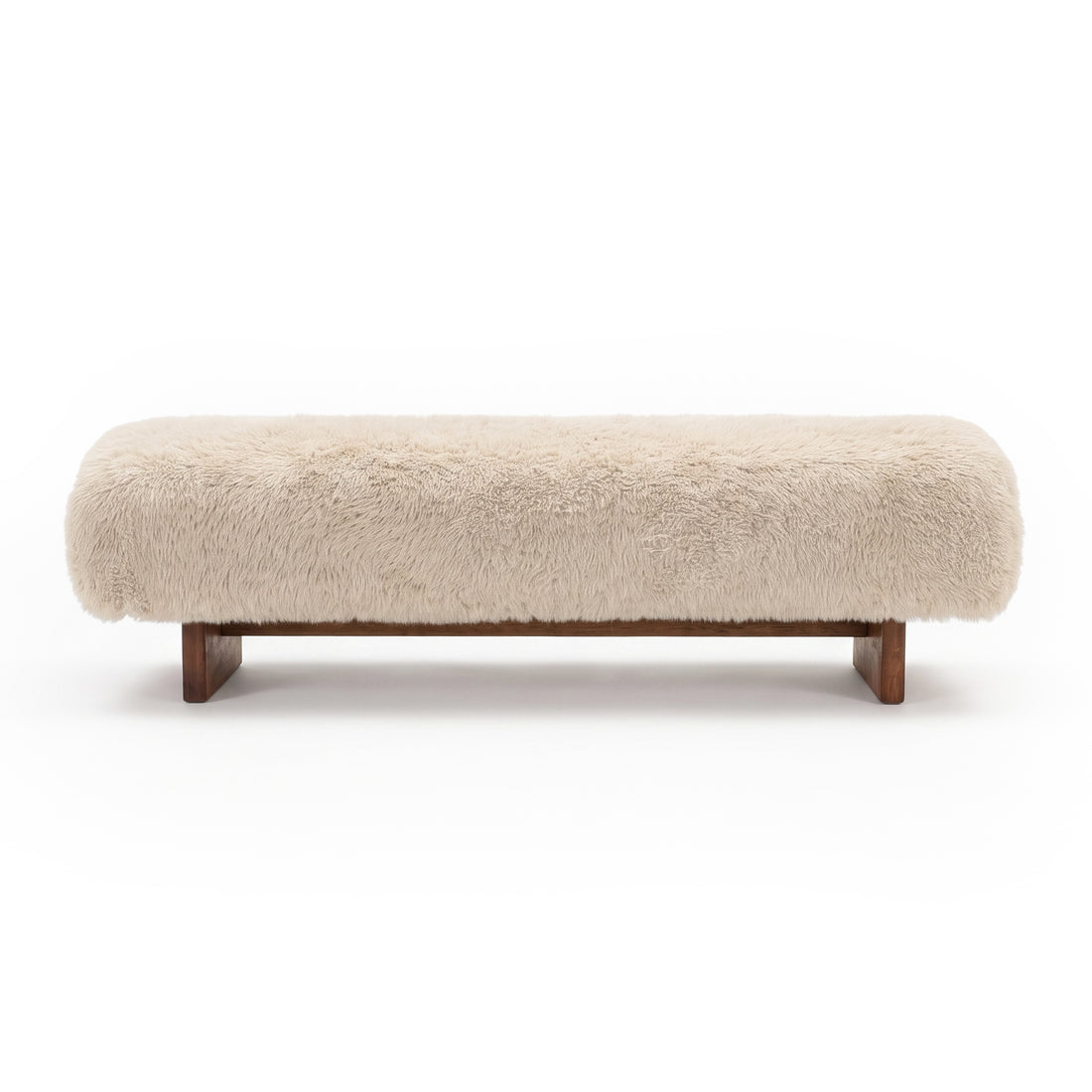 Beige plush upholstered bench with wooden legs on a white background