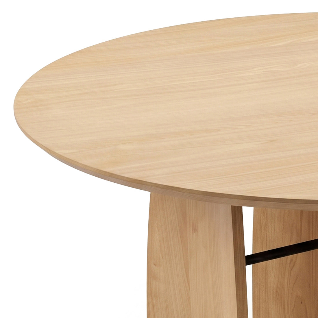 Partial view of a round wooden table on white background