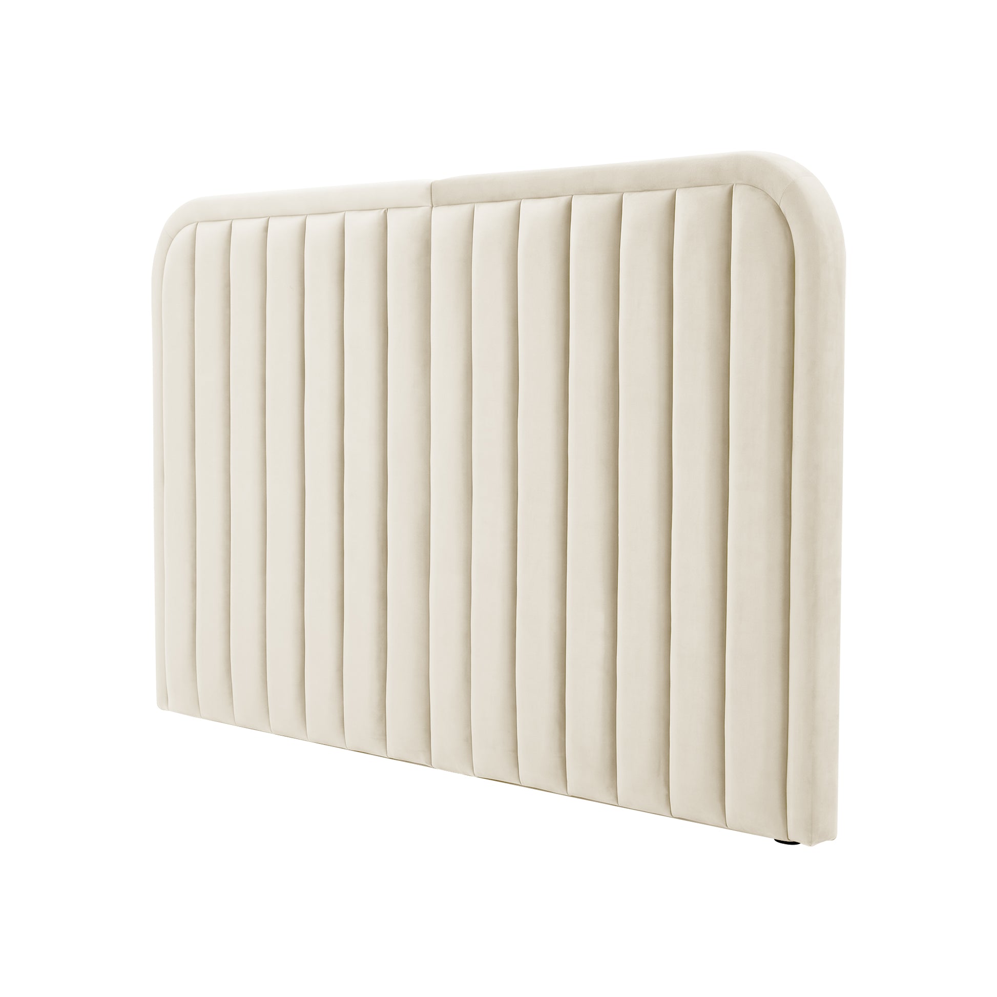 Angled view of cream upholstered headboard on white background