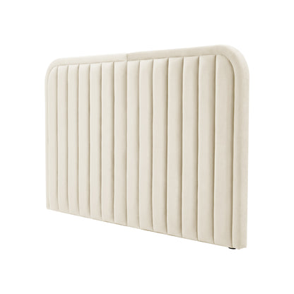 Angled view of cream upholstered headboard on white background