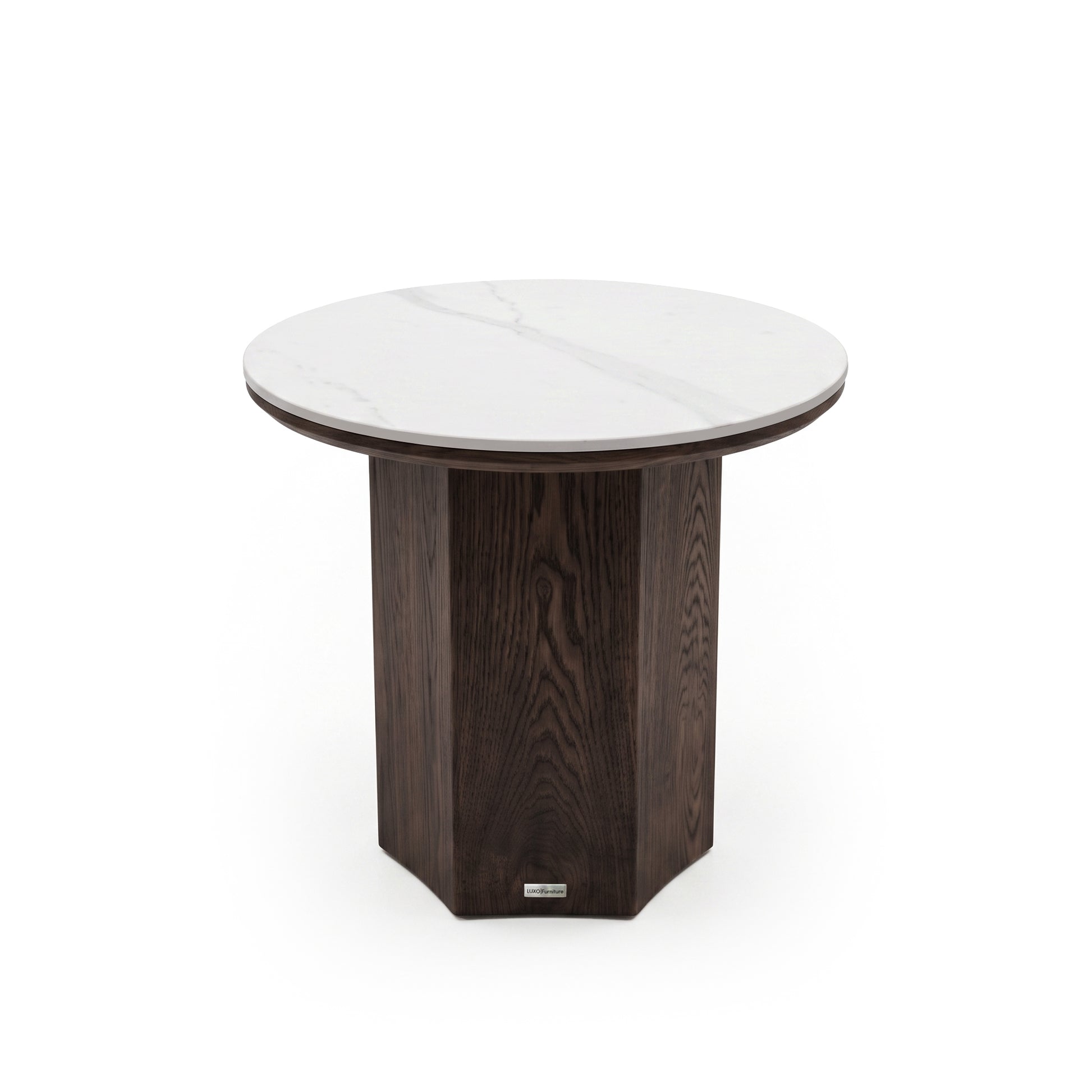 Round side table with a white marble top and dark geometric pedestal base on a white background
