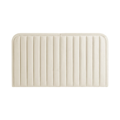 Cream upholstered headboard with vertical channels on white background