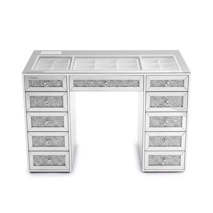 Head-on view of a mirrored vanity desk with eleven drawers on white background