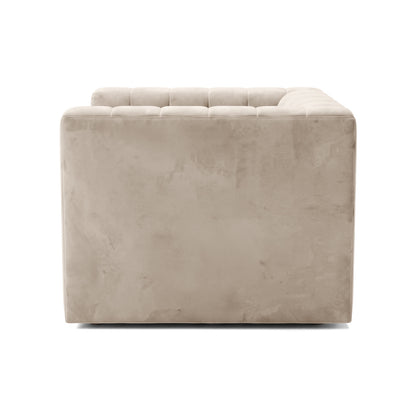 Side view of a beige upholstered sofa on a white background