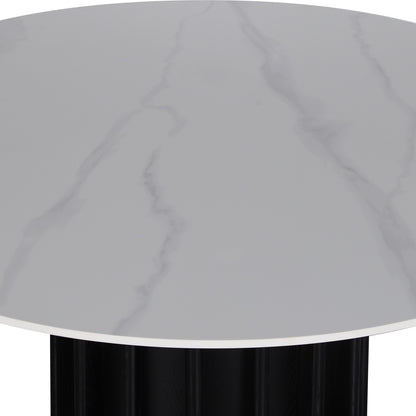 Gabi 120cm Marble Look Dining Table in Black features a white marble-patterned top with subtle grey veining, resting on a vertically fluted black base, offering a modern, compact dining solution.