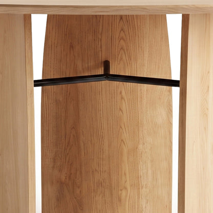 Close-up of wooden furniture underside with metal support bars