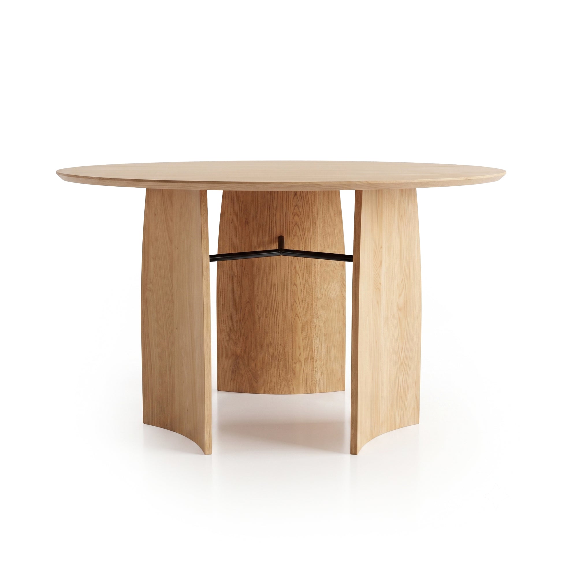 Round wooden dining table on white background with curved panel legs