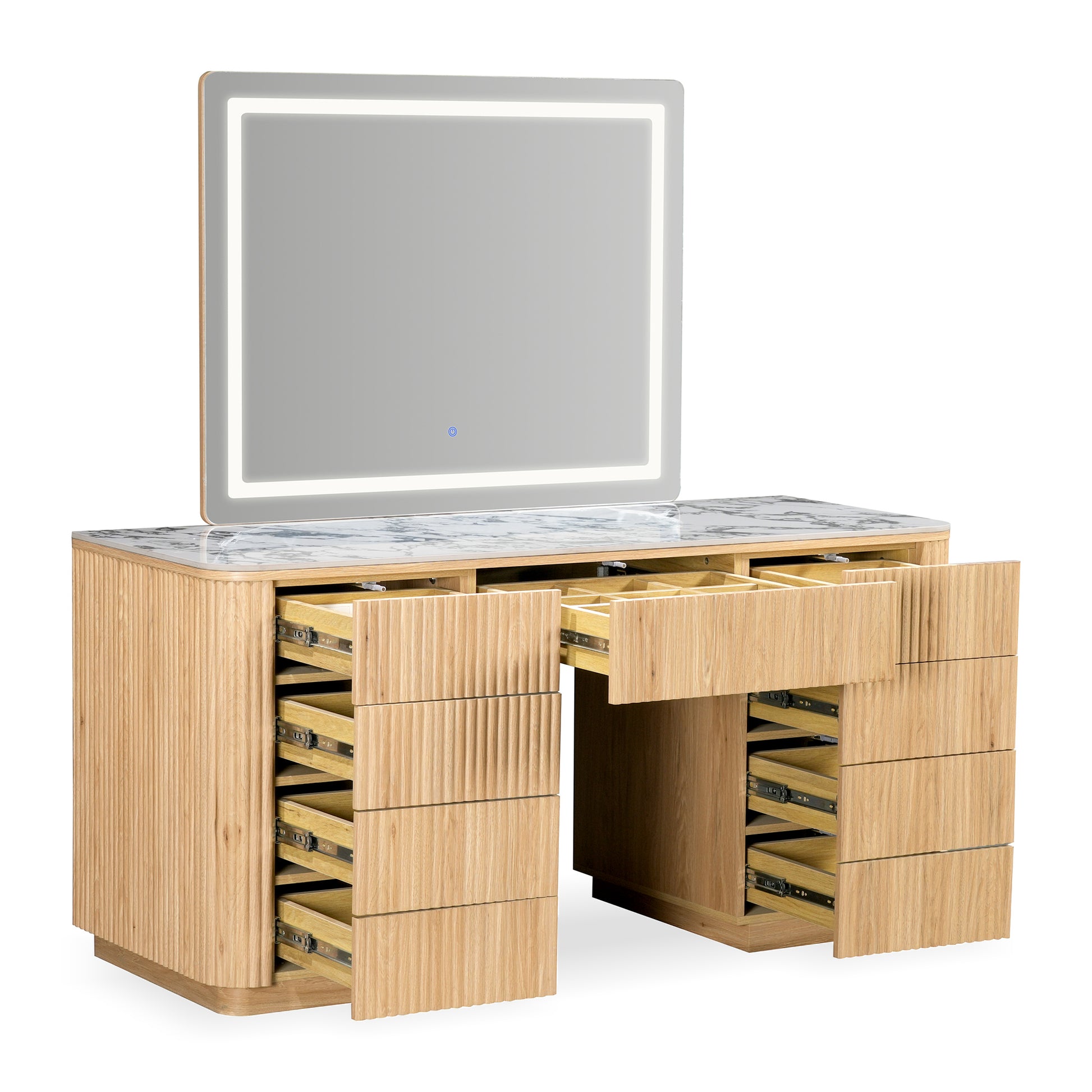 Vanity table with partially open drawers and lit mirror on a white background