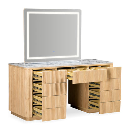 Vanity table with partially open drawers and lit mirror on a white background