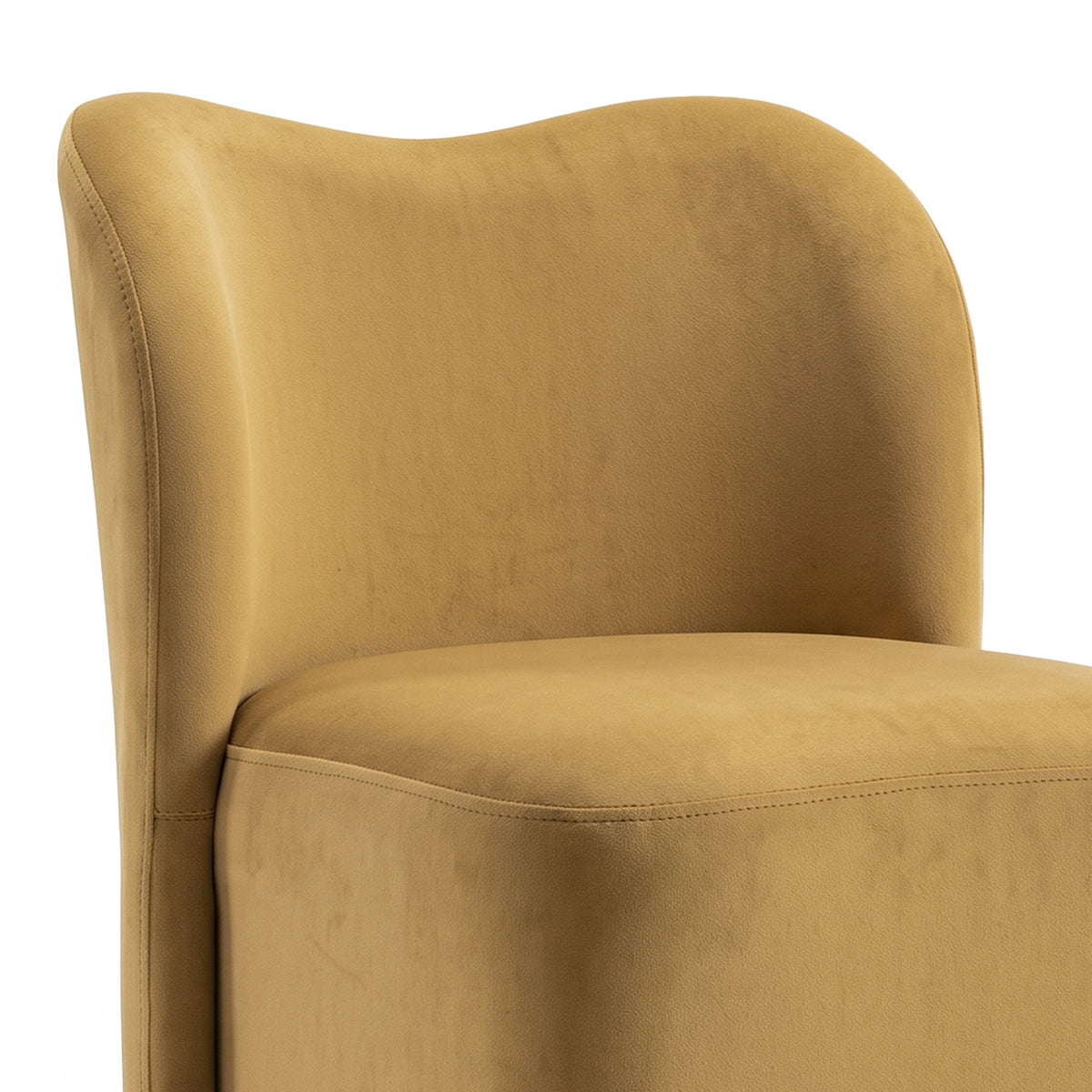 Close view of the backrest and seat of a mustard upholstered chair