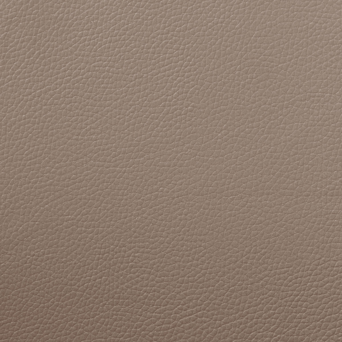 Close-up of beige textured upholstery material